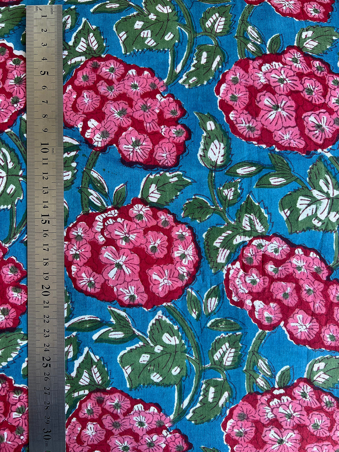 cotton fabric | teal blue green large pink blossoms